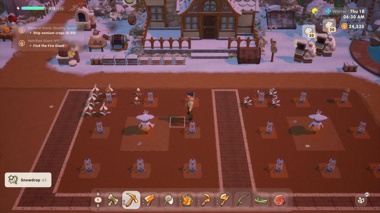 A screenshot from Coral Island showing the male main character standing in his mostly barren winter farm