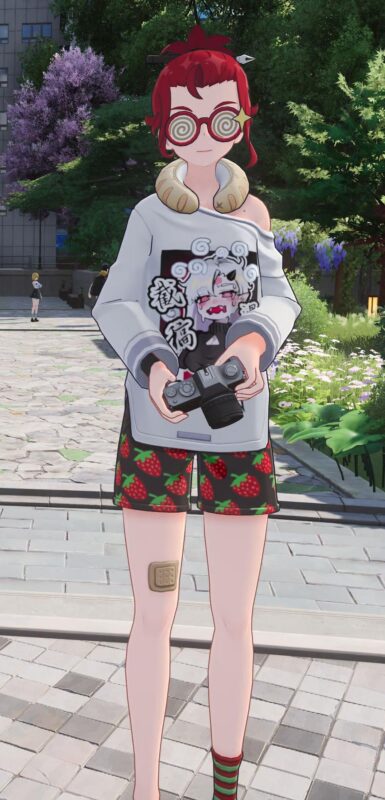 A red-haired young woman with spiral sunglasses. She holds a camera.